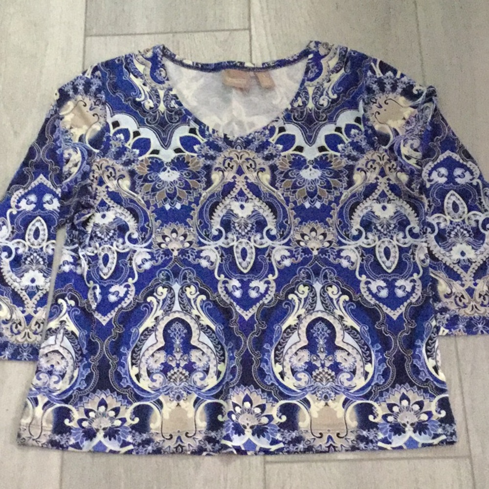 Chico’s blue V-neck long sleeved blouse